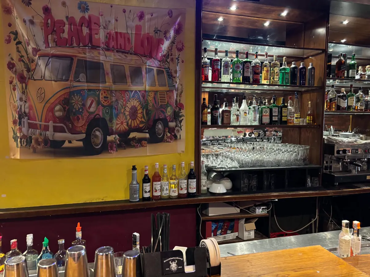 The bar with the Peace and Love van mural