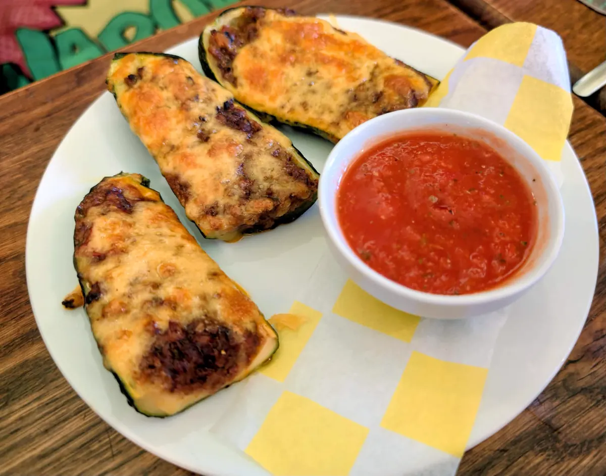 Stuffed zucchini boats with melted cheese